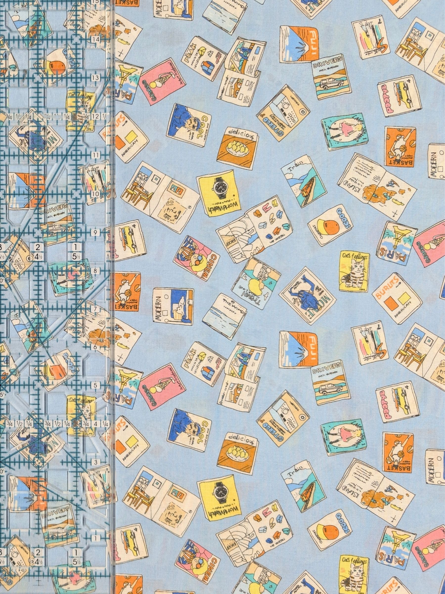 Hokkoh - Retro Magazines Cotton Lawn Fabric - Light Blue