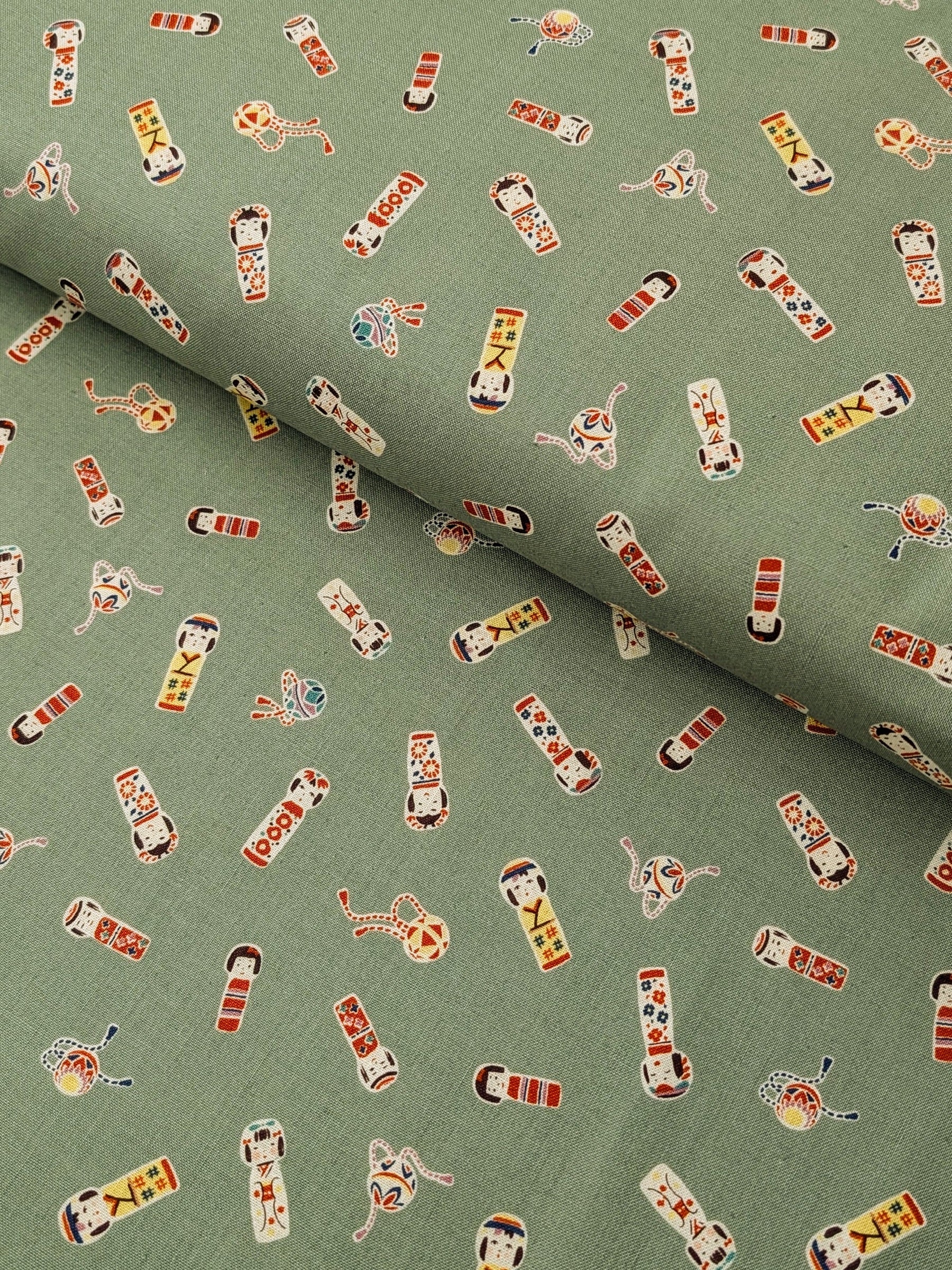 Cosmo - Kokeshi Doll Cotton Sheeting Fabric - Green
