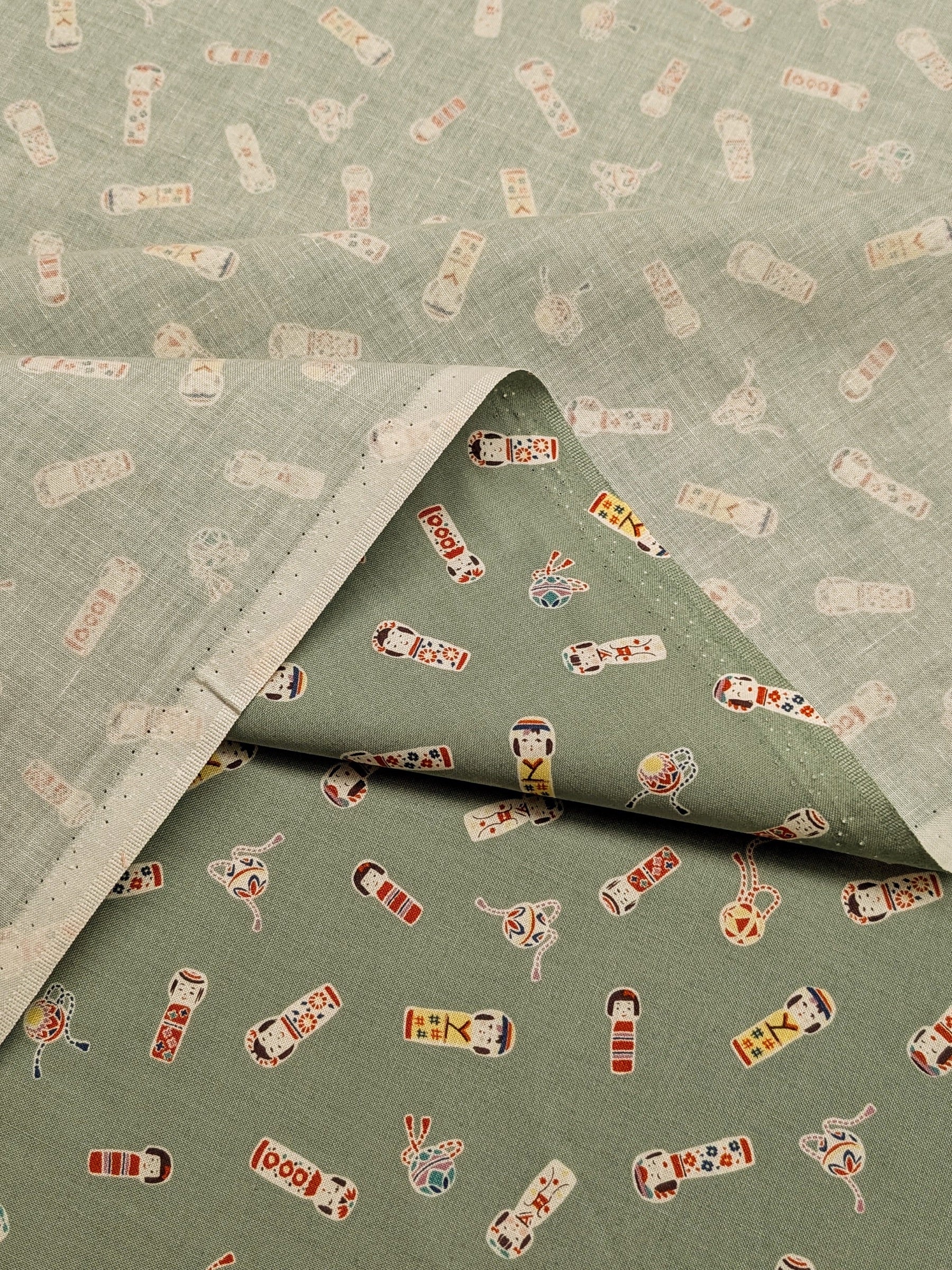Cosmo - Kokeshi Doll Cotton Sheeting Fabric - Green