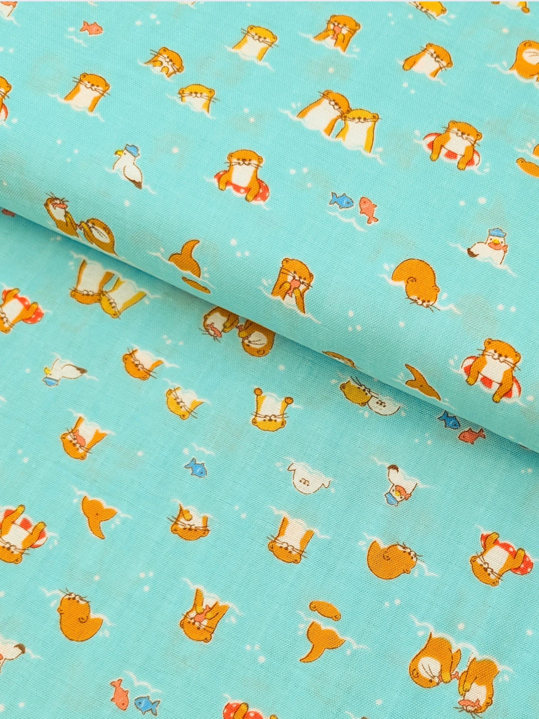 Cosmo - Little Otters Cotton Double Gauze Fabric - Teal REMNANT