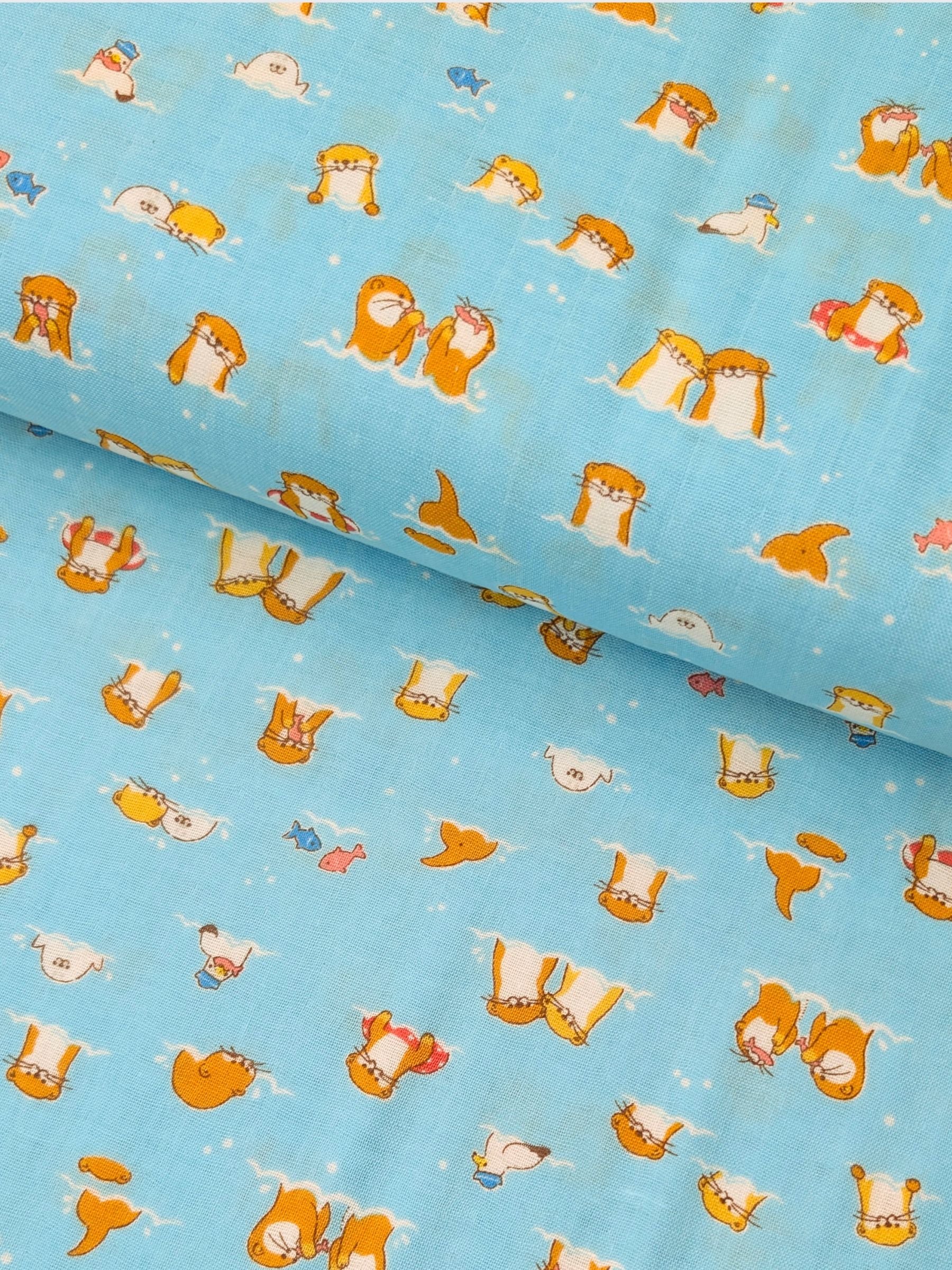 Cosmo - Little Otters Cotton Double Gauze Fabric - Blue
