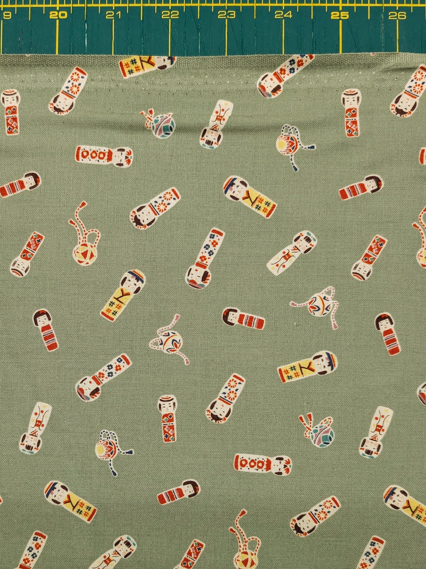 Cosmo - Kokeshi Doll Cotton Sheeting Fabric - Green