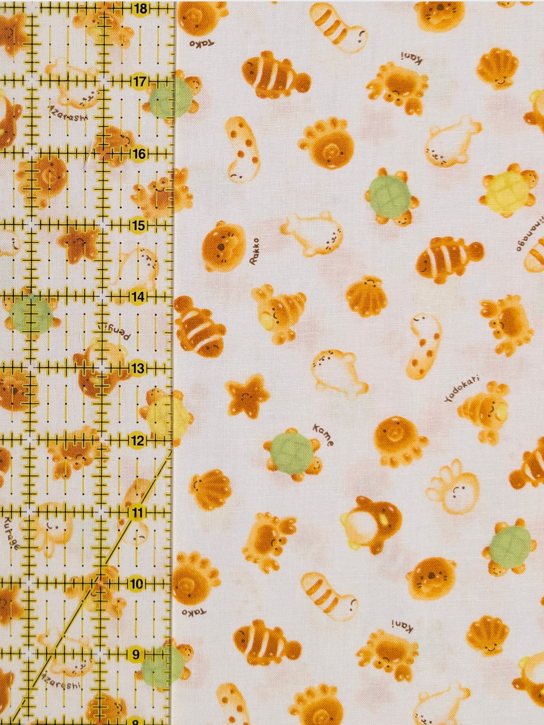 Cosmo - Cutesie Ocean Breads Cotton Sheeting Fabric - White