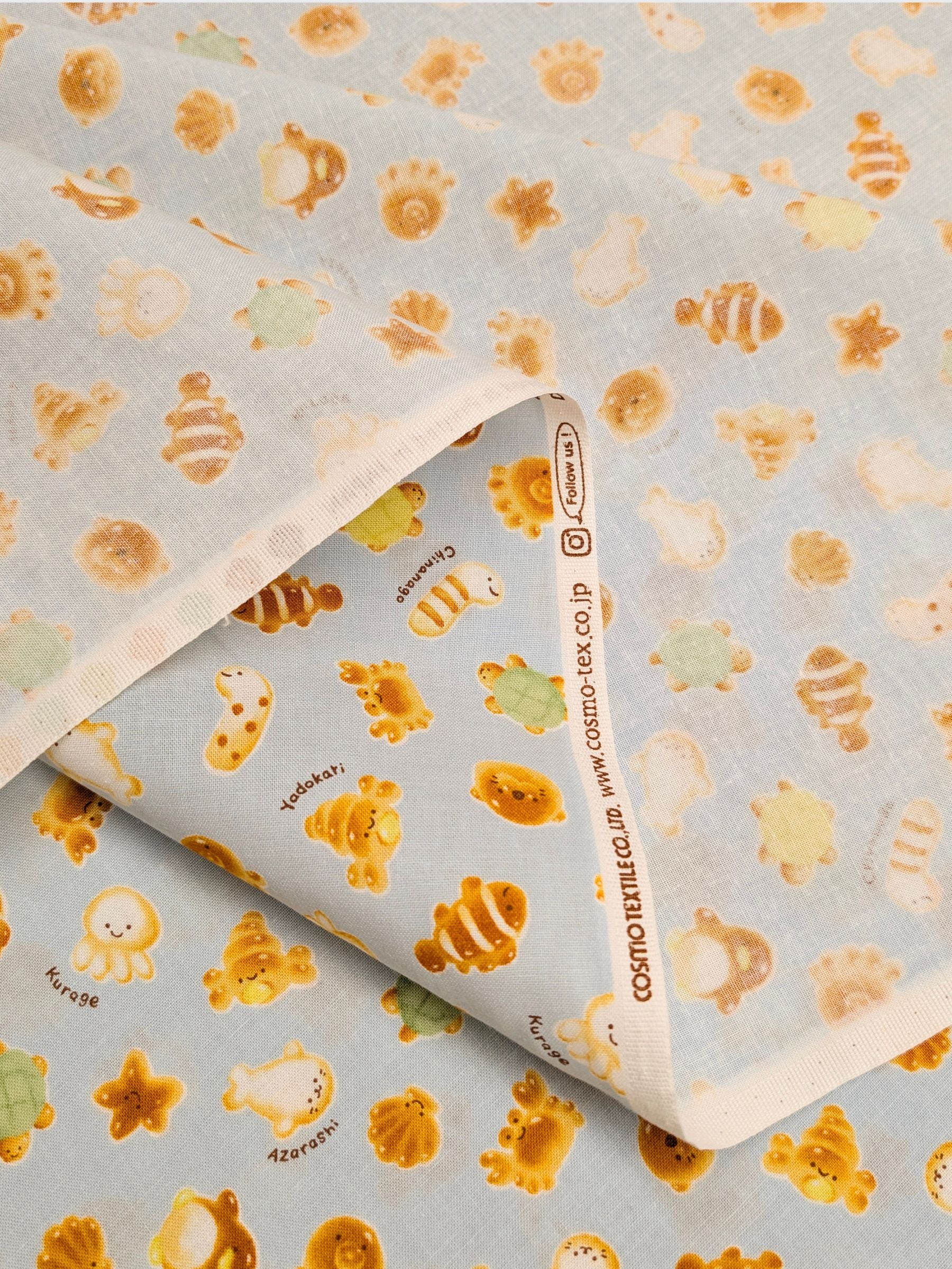 Cosmo - Cutesie Ocean Breads Cotton Sheeting Fabric - Blue