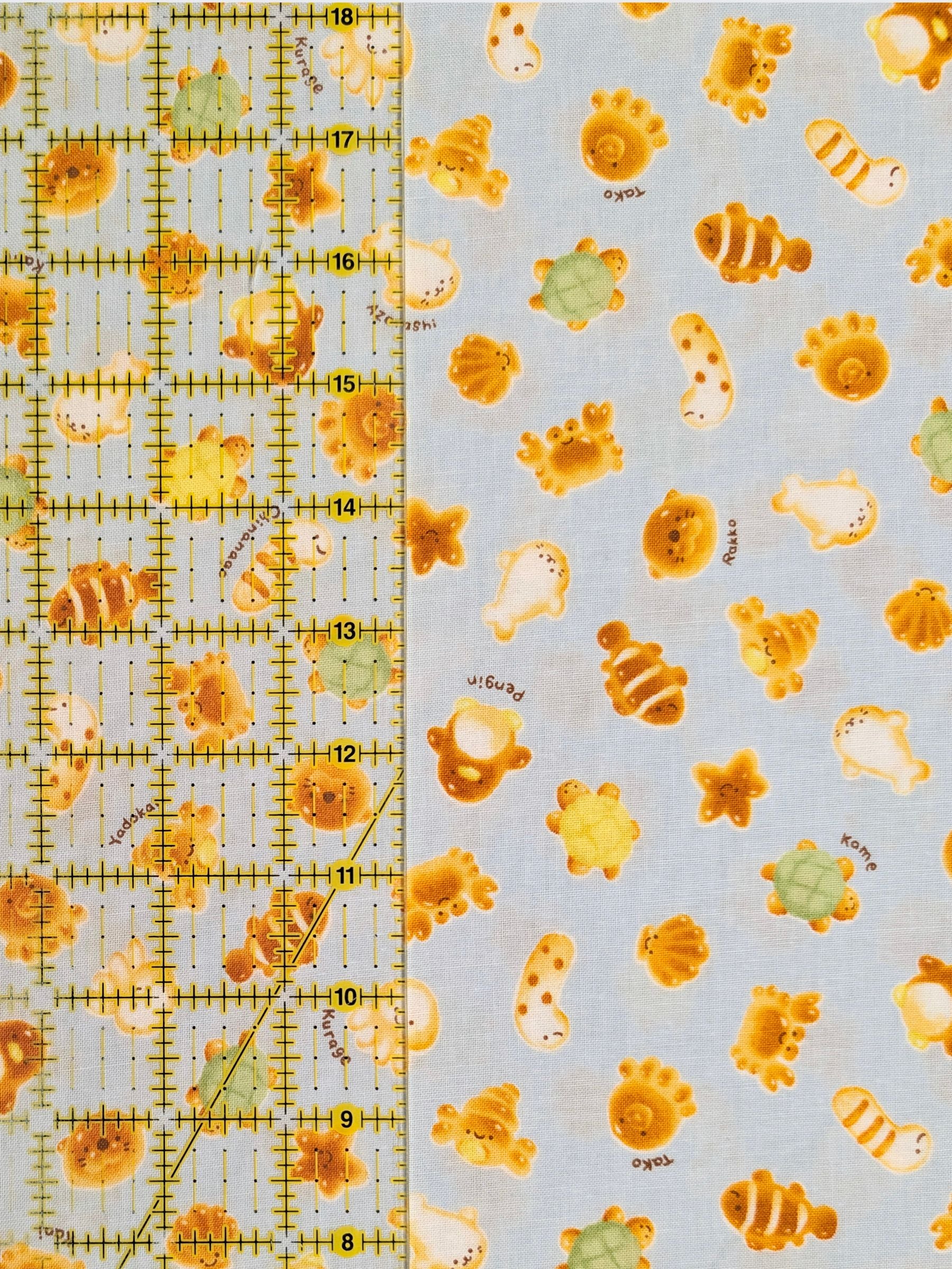 Cosmo - Cutesie Ocean Breads Cotton Sheeting Fabric - Blue