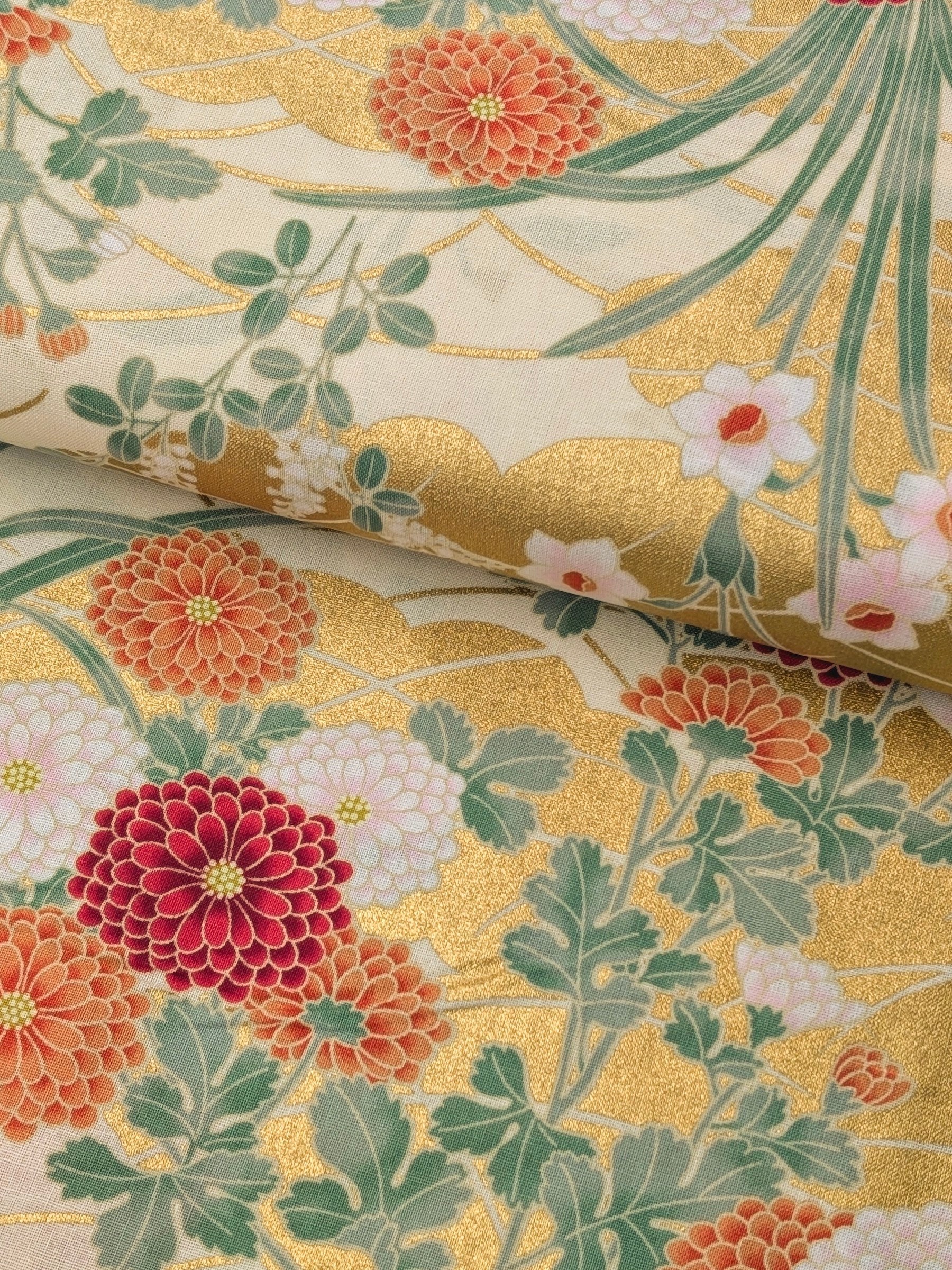 Naka - Golden Flower Fields Cotton Sheeting Fabric - Red & Orange